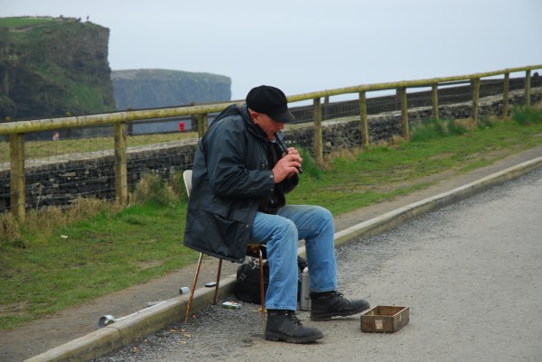 Cliffs Busker playing the whistle