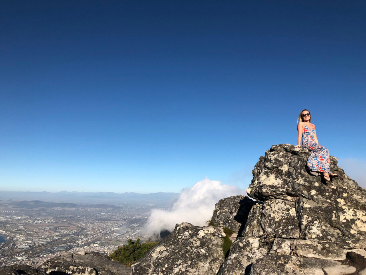 Sitting on a rock on the top of Table Mountain