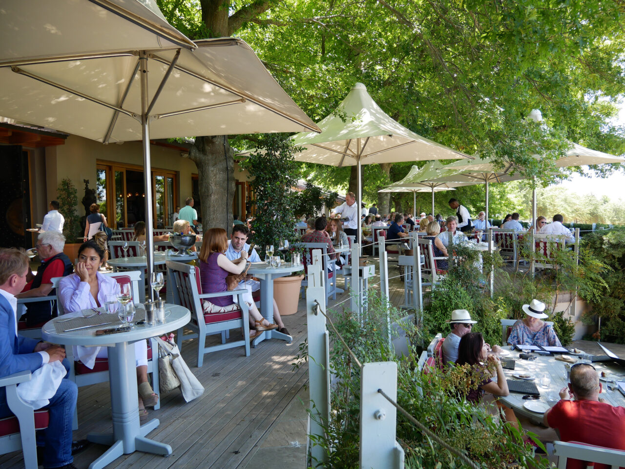 People dining at Delaire Graff Estate restaurant, Cape Town