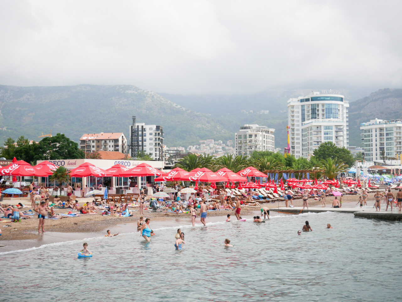 Beach Greco crowded with tourists in Budva, Montenegro