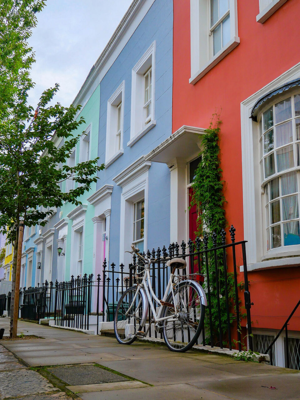 Bike in front of colorful buildings in Notting Hill London