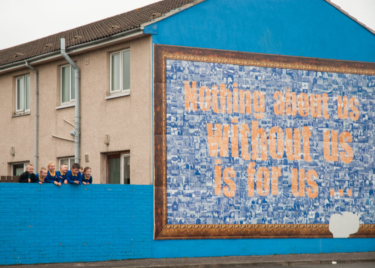 Nothing about us without us is for us mural in Belfast