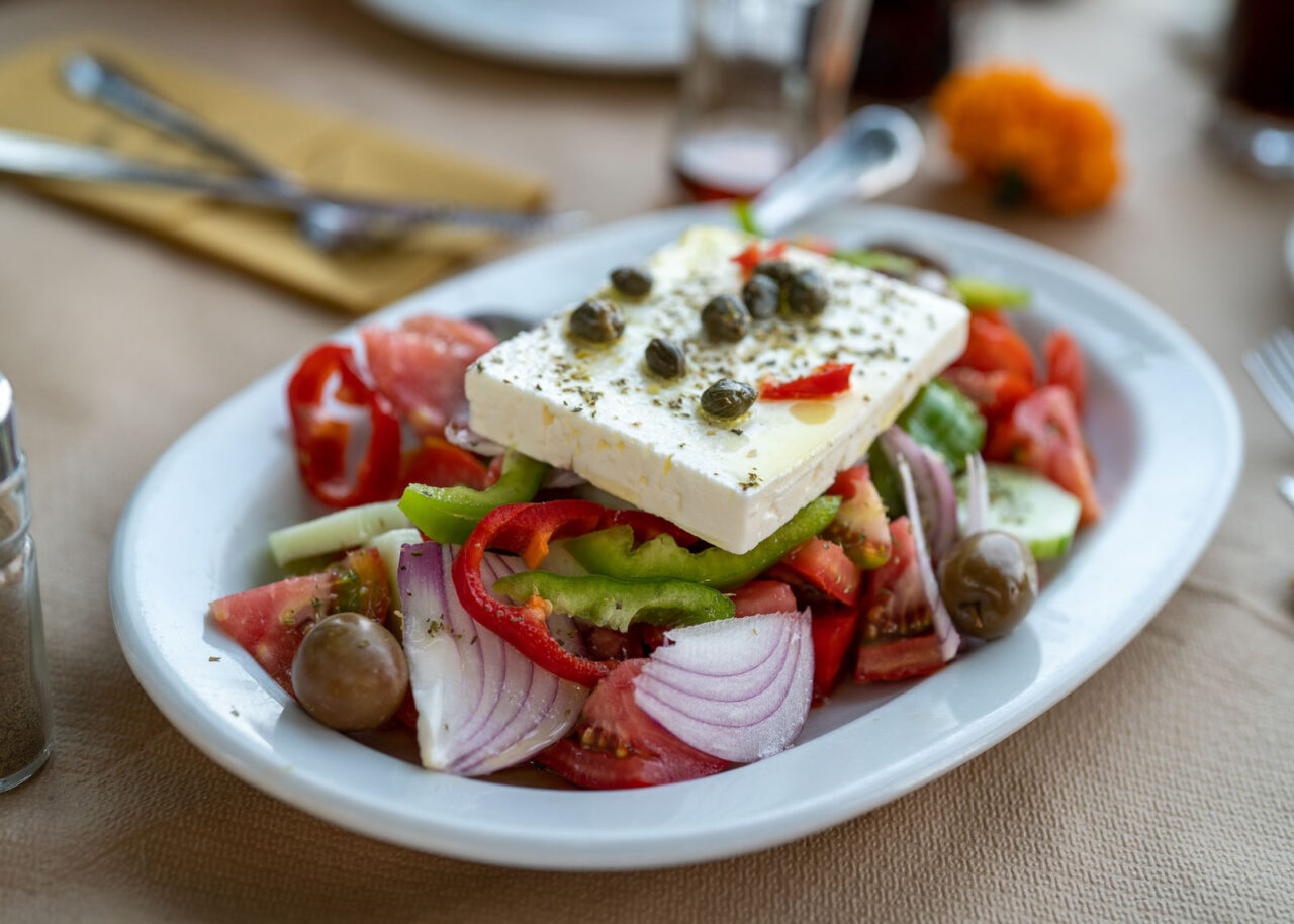 Feta cheese on top of a Greek salad
