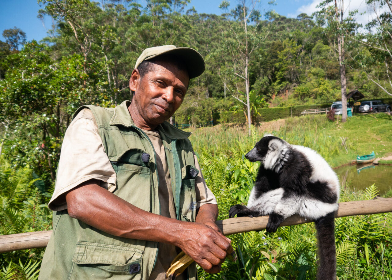 Guide with lemur on Lemur Island, Madagascar