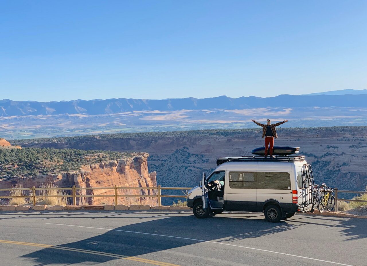 Van with rooftop cargo box in Colorado