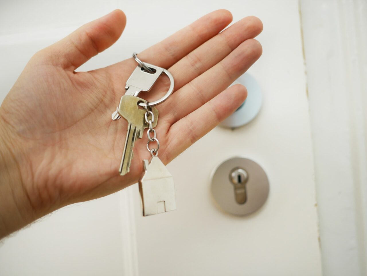 Hand holding set of keys