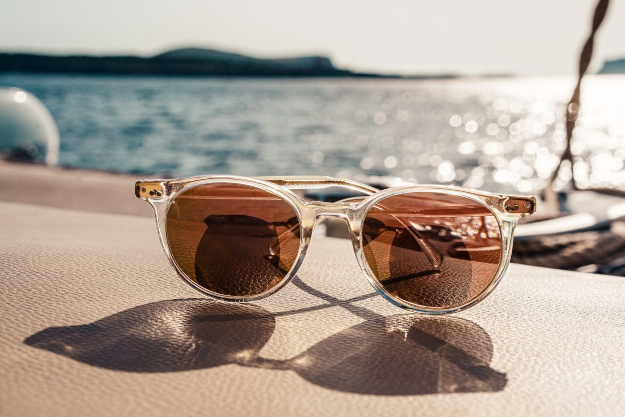 Sunglasses by the water