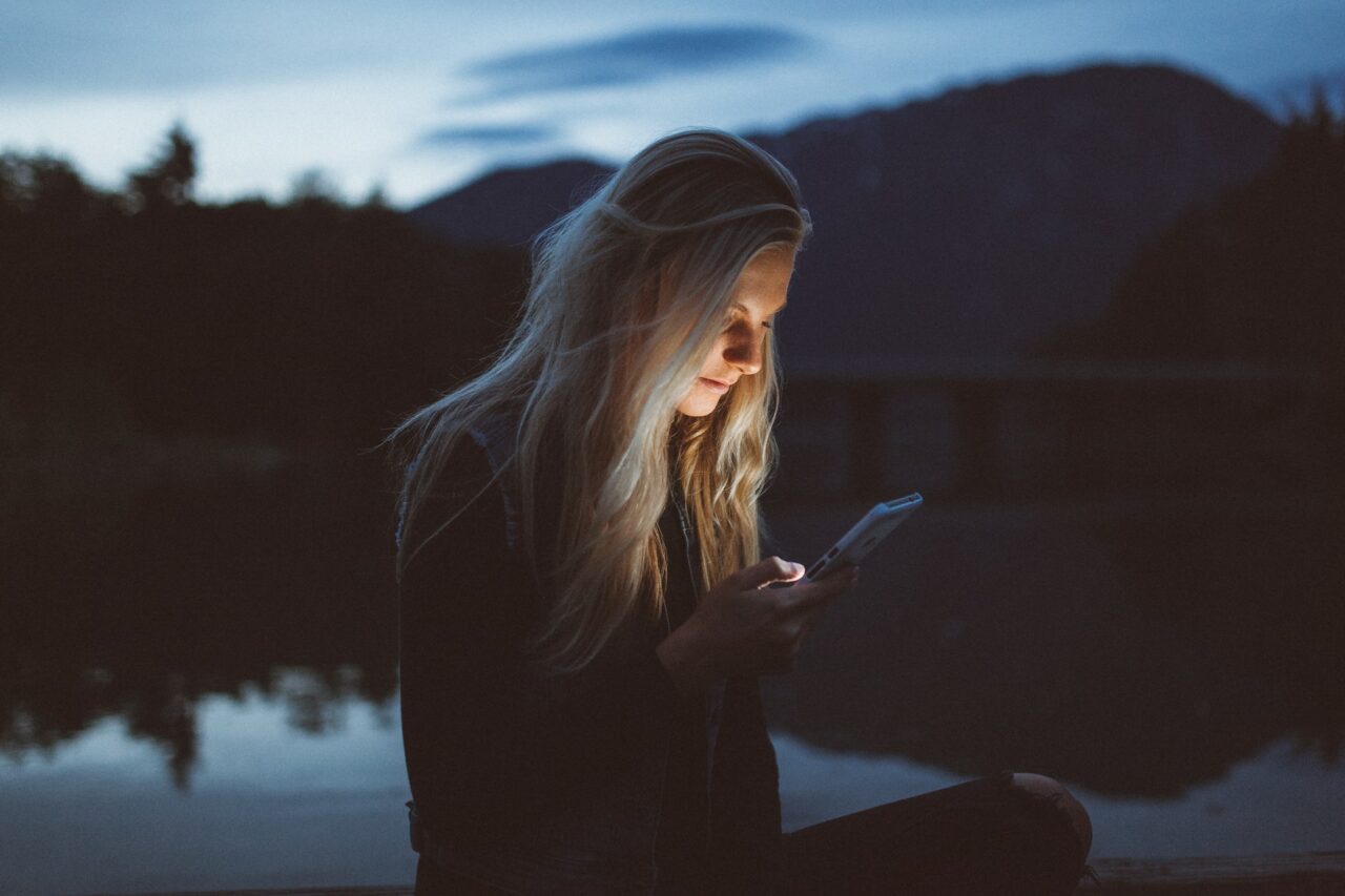 Girl texting at night