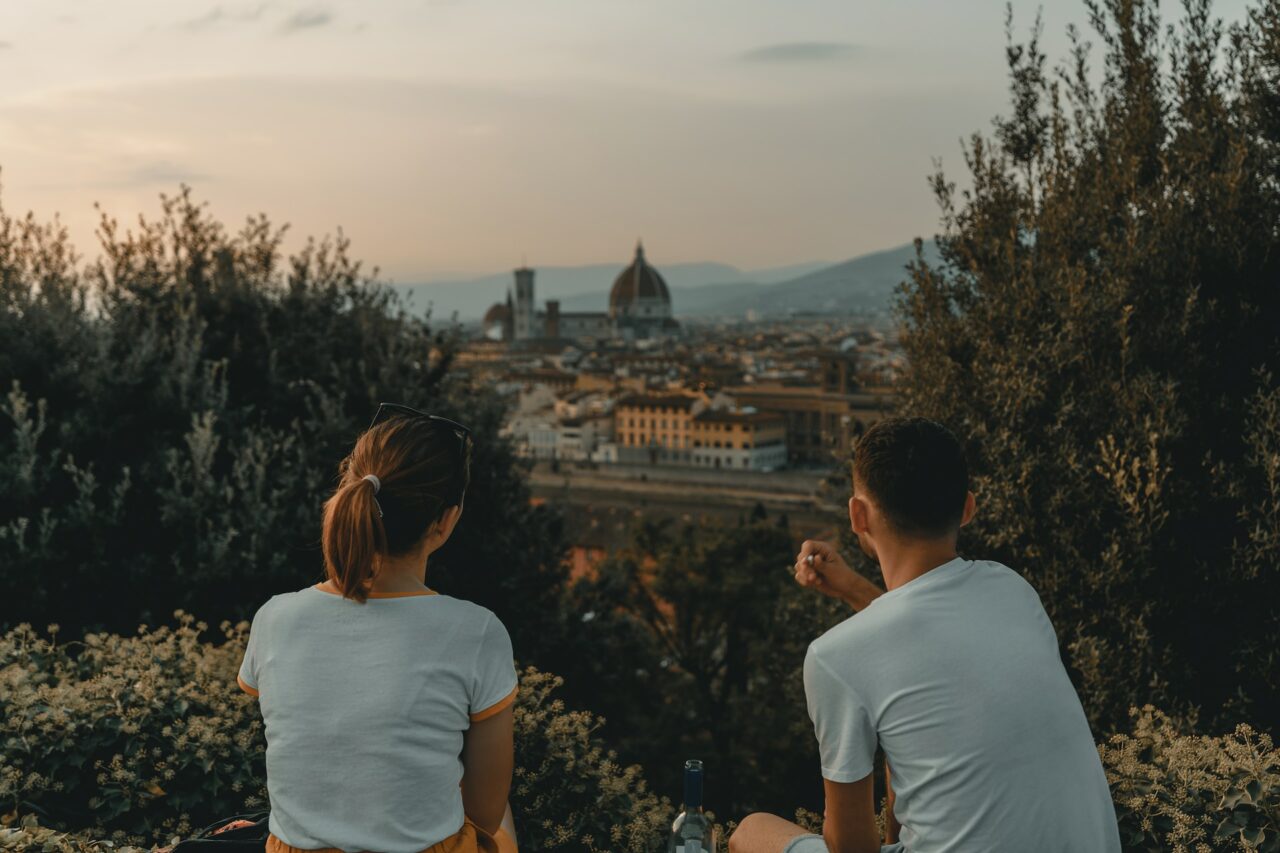 Man and woman traveling in Italy