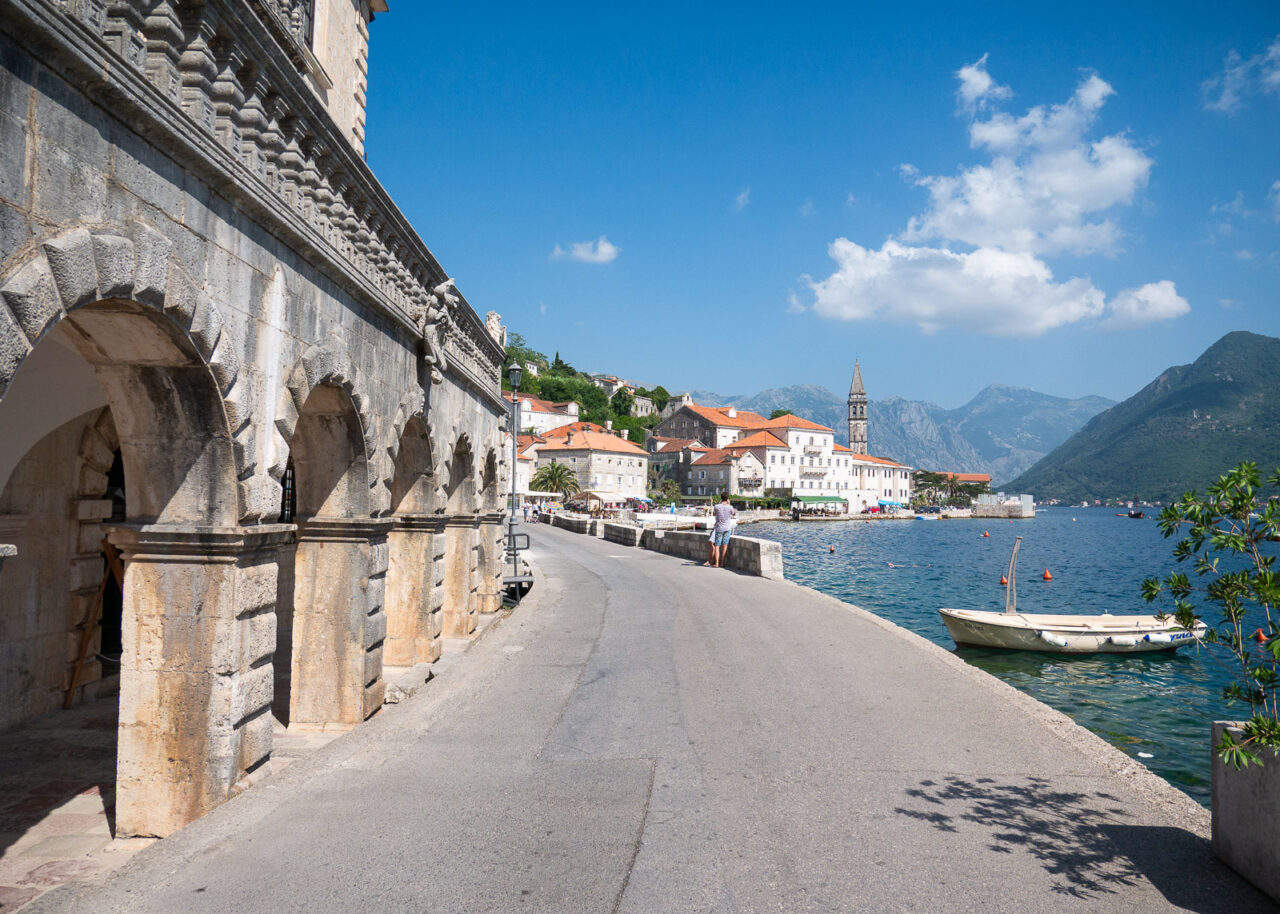 Waterfront promenade and archways in Perast, Montenegro
