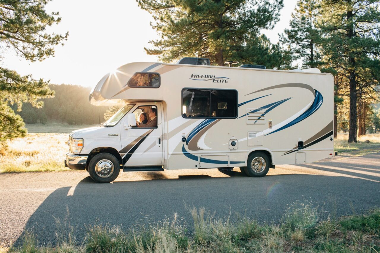 Couple driving an RV on the road