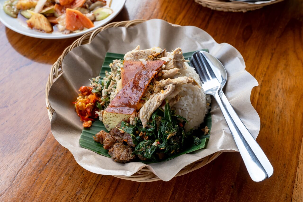 Plate of Babi Guling roasted pork - famous food Bali is known for