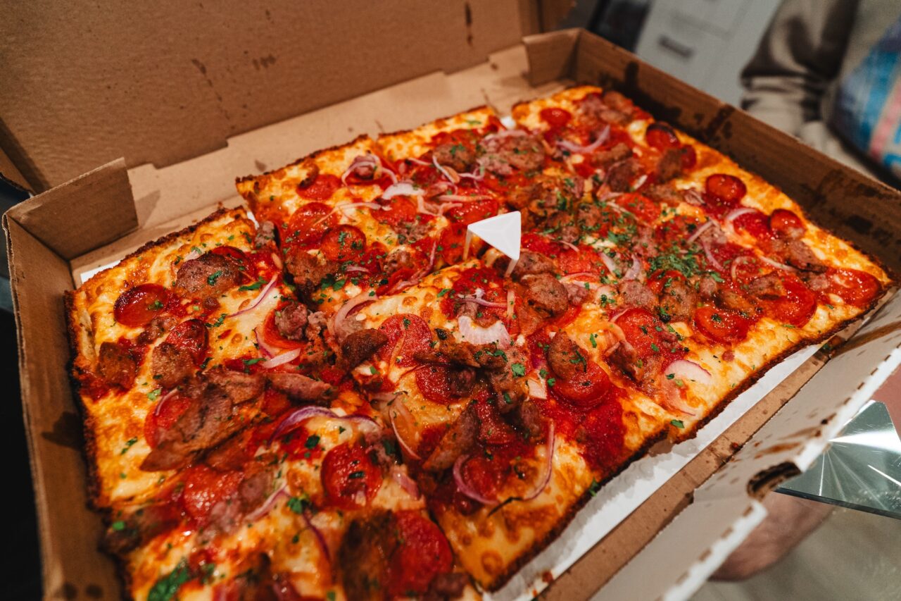 Detroit style square pizza with pepperoni and sausage