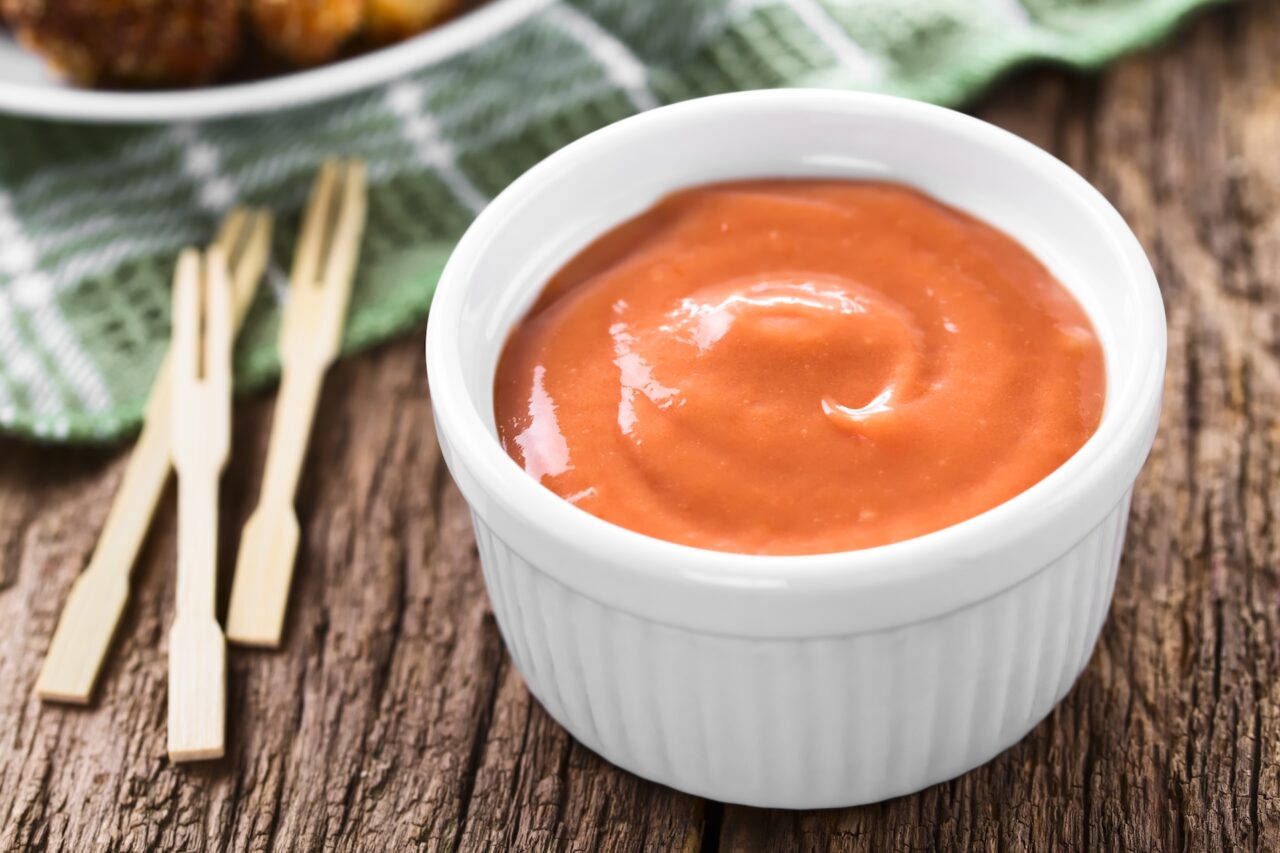 White dish containing fry sauce