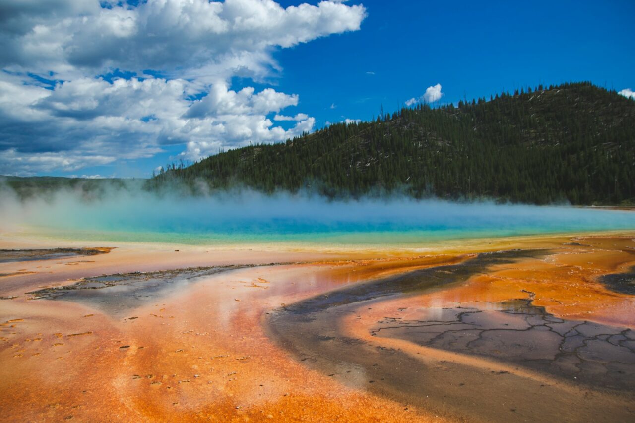 Grand Prismatic spring on a sunny day in Yellowstone National Park