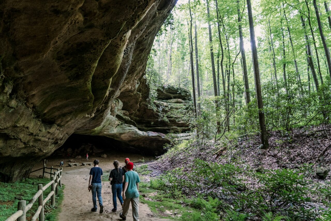 People walking through Hazard Cave in Tennessee