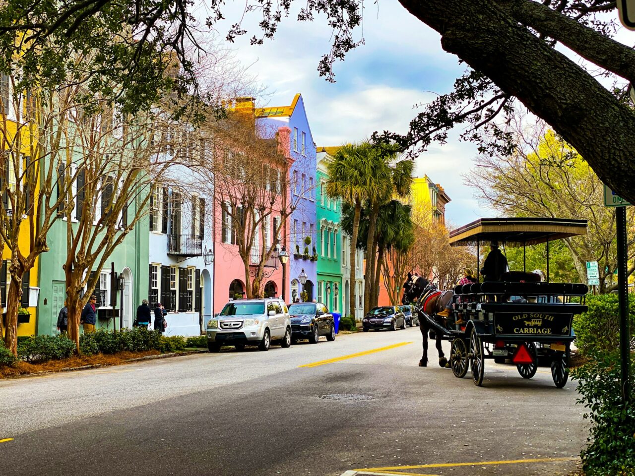 Horse and carriage with colorful buildings on Rainbow Row, South Carolina