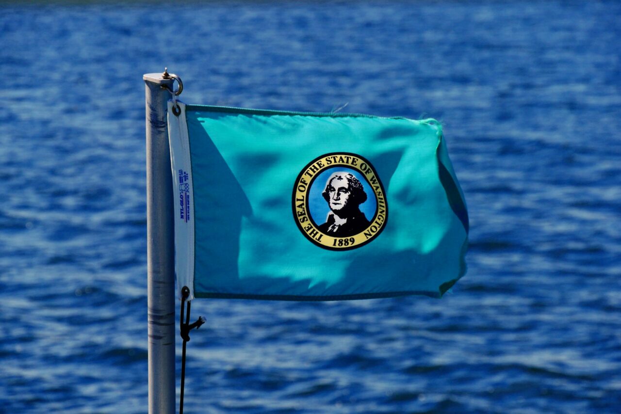 Washington Flag on the ocean