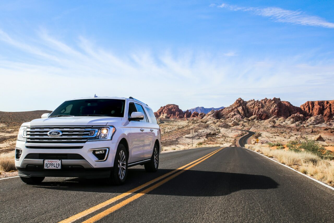 White Ford expedition on a road in the Valley of Fire, USA