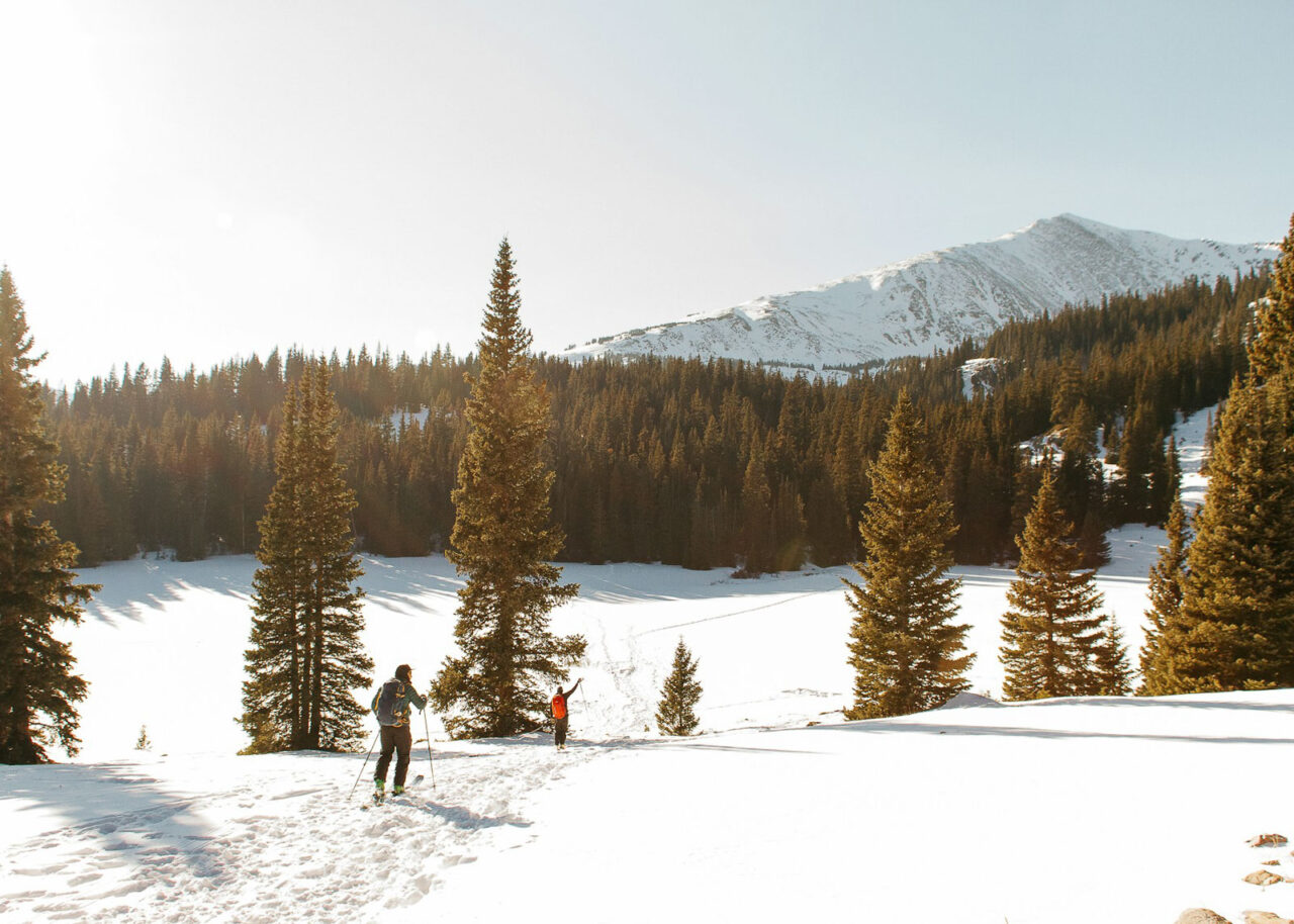 Skiers on a snowy mountain in Colorado
