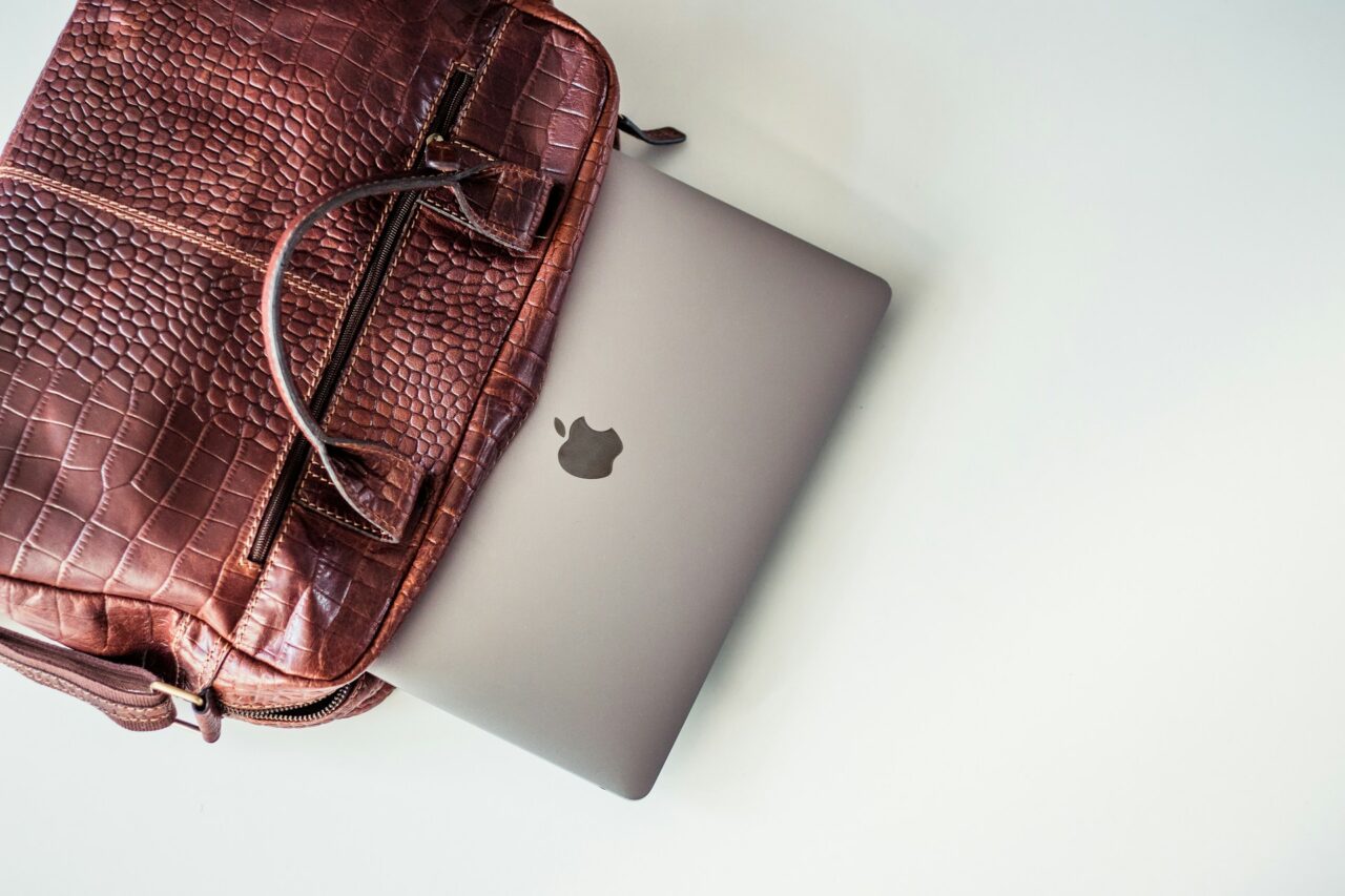 Macbook in a leather bag