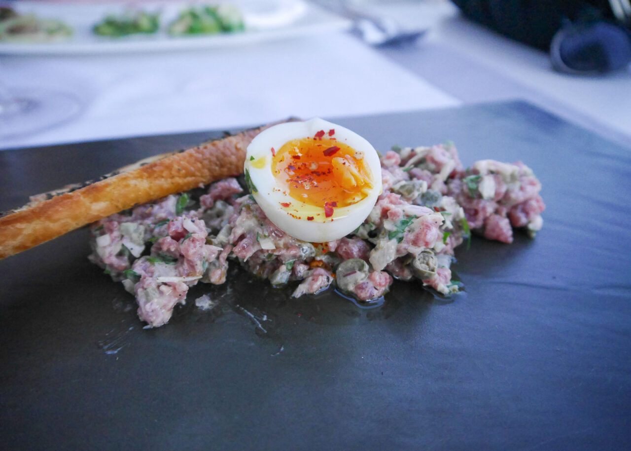 Beef tartare with an egg on top at Dukley Beach Lounge, Montenegro