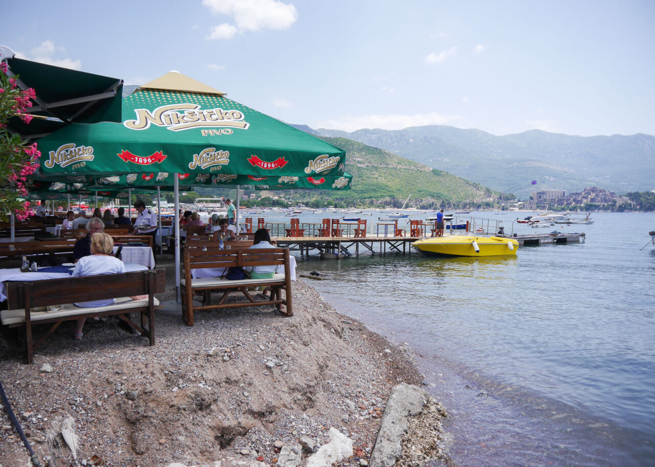 Tables on the beach at Jadran restaurant in Budva, Montenegro
