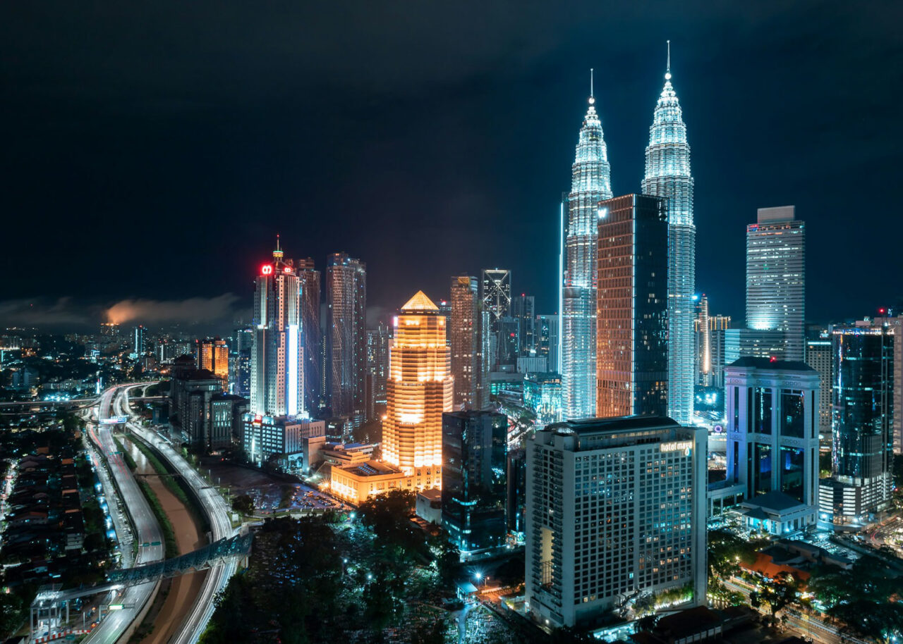 Kuala Lumpur skyline at night with the Petronas Towers