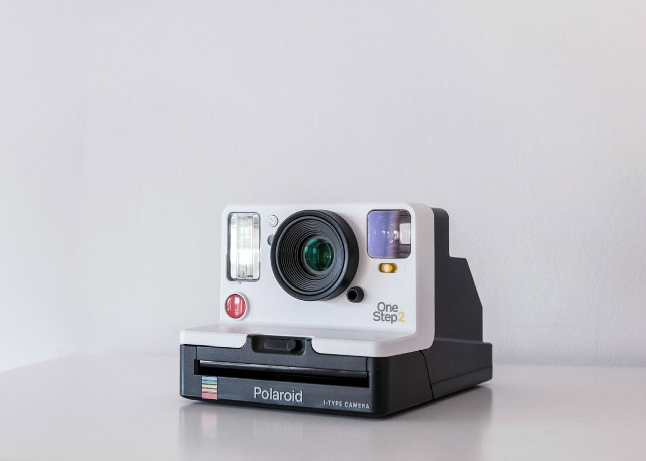 Polaroid camera on a white background
