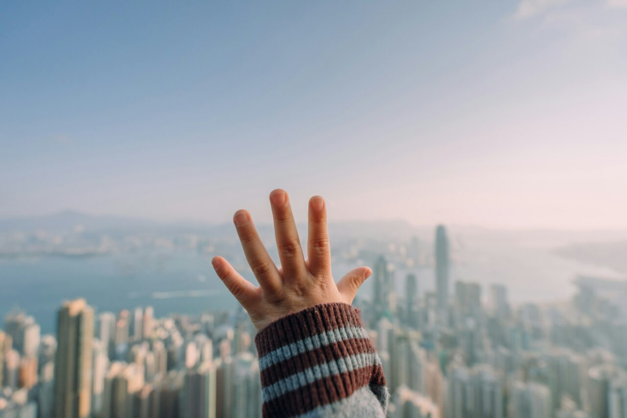 Babies hand against the window in Hong Kong