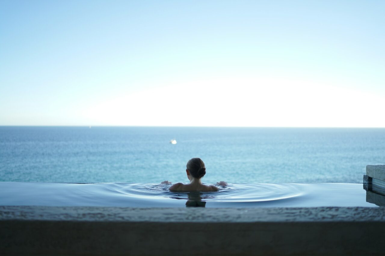 Woman in an infinity pool in Mexico