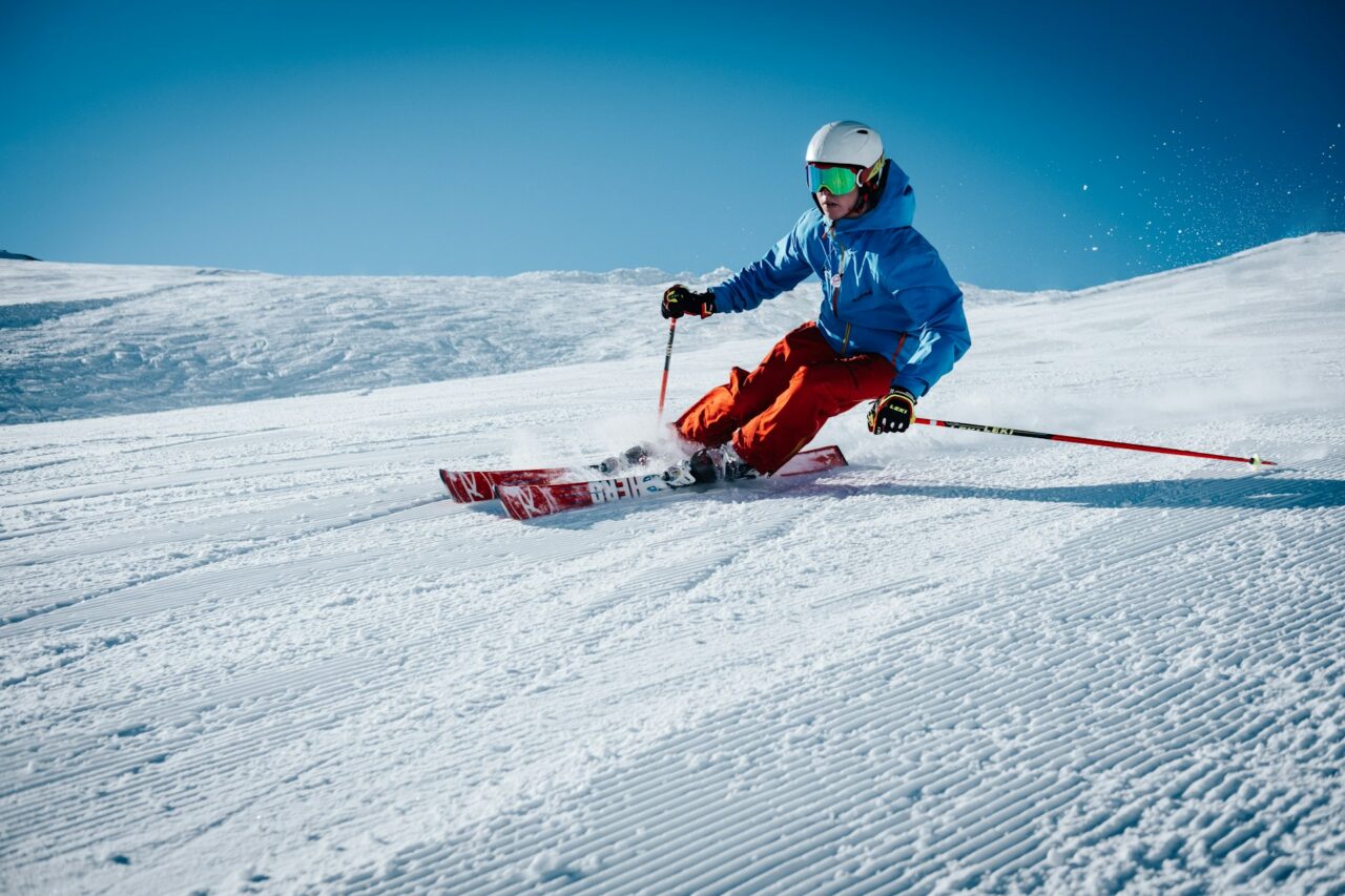 Person skiing down a snowy hill