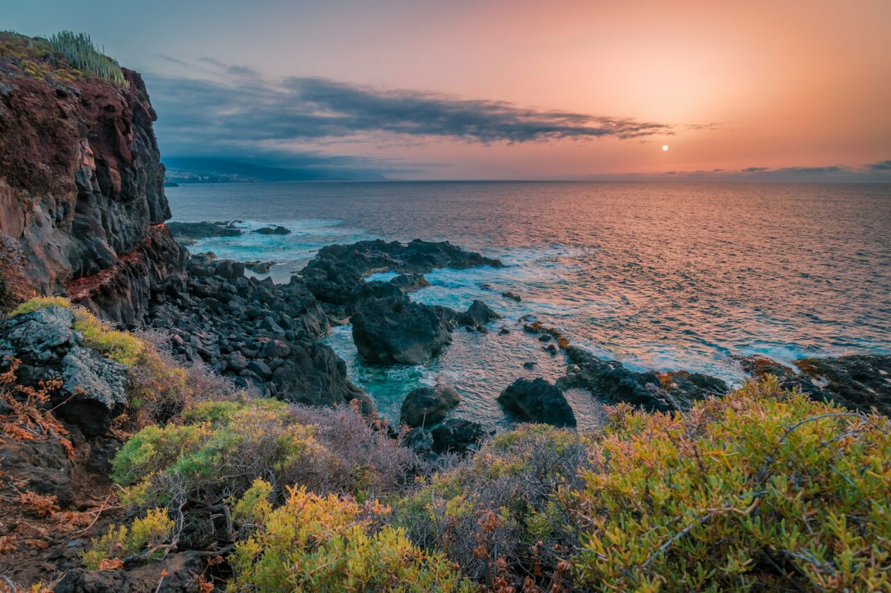 Sunset over a rocky coastline in Tenerife