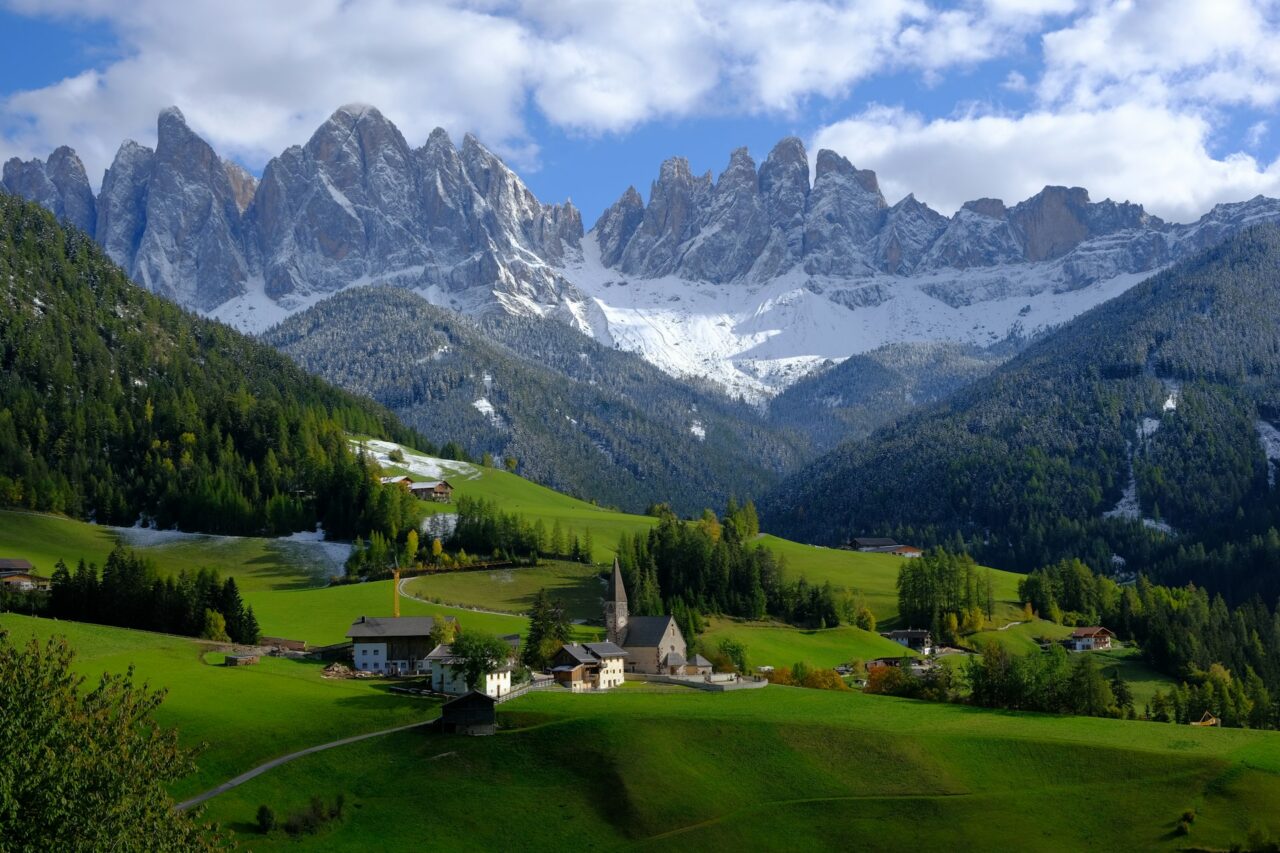 Green grass and mountains in the dolomites
