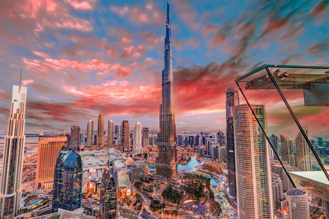 View of Burj Khalifa and buildings at sunset in Dubai