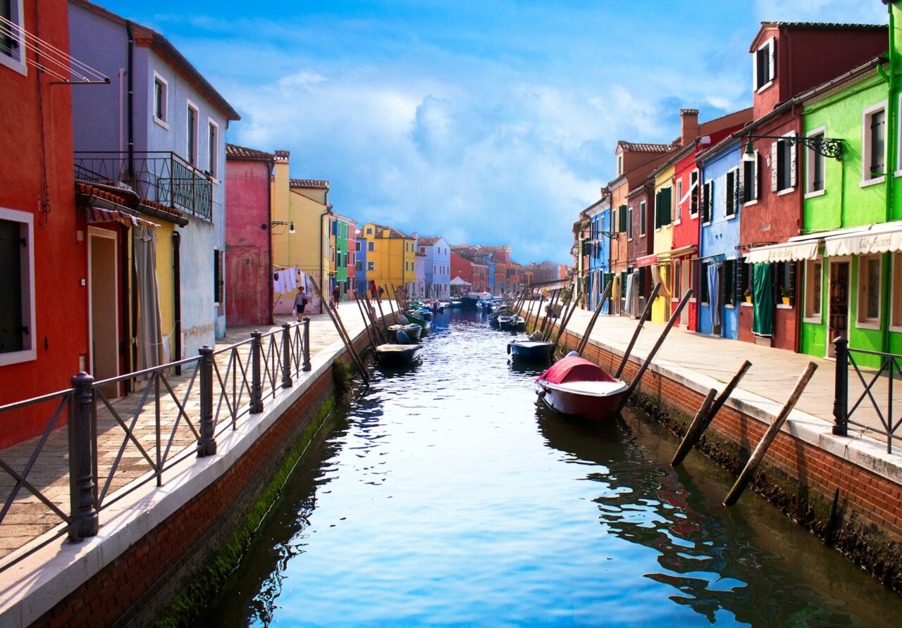 Colorful houses along a canal in Murano