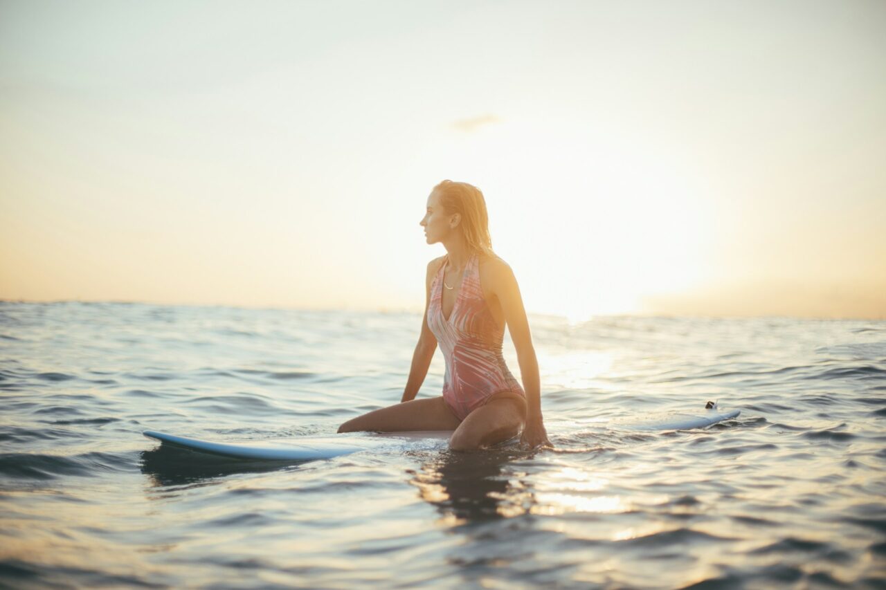Woman on a surf board in the ocean