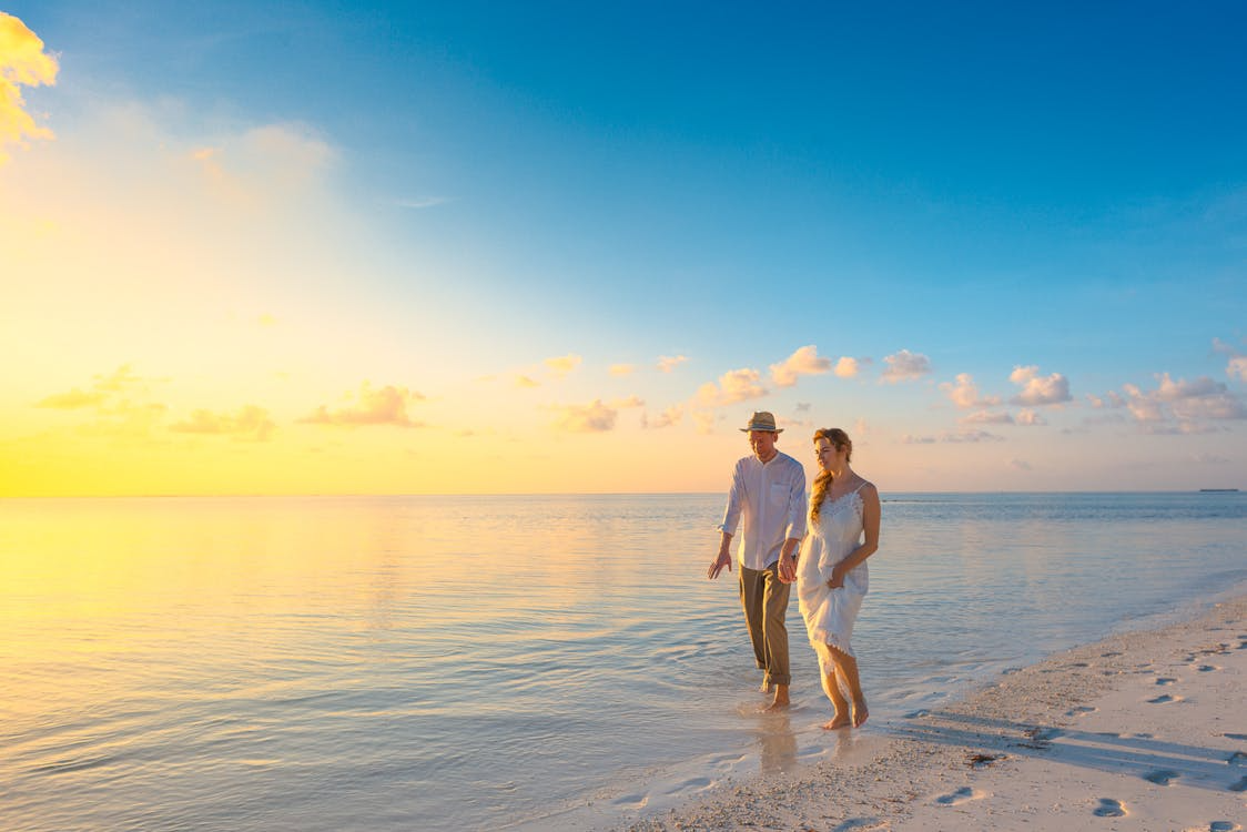 couple walking on a beach