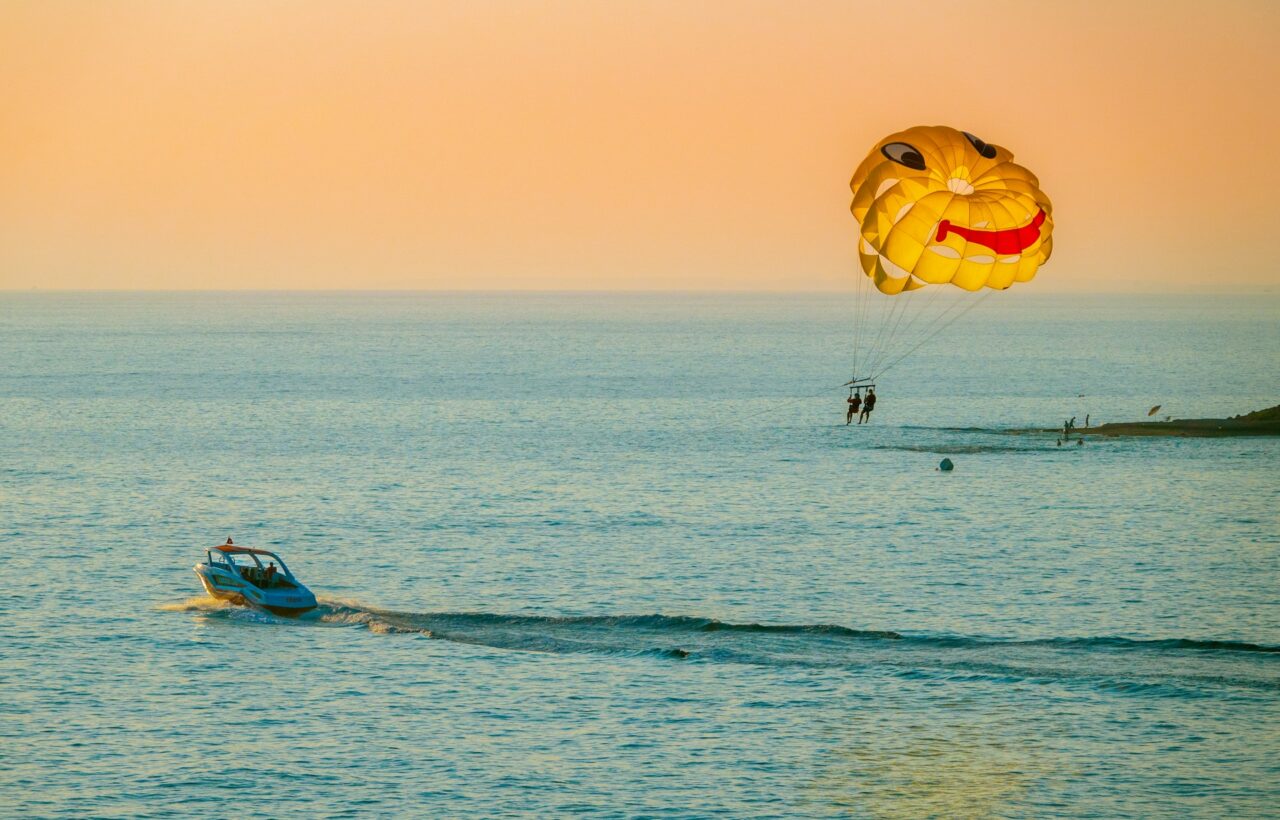Two people parasailing
