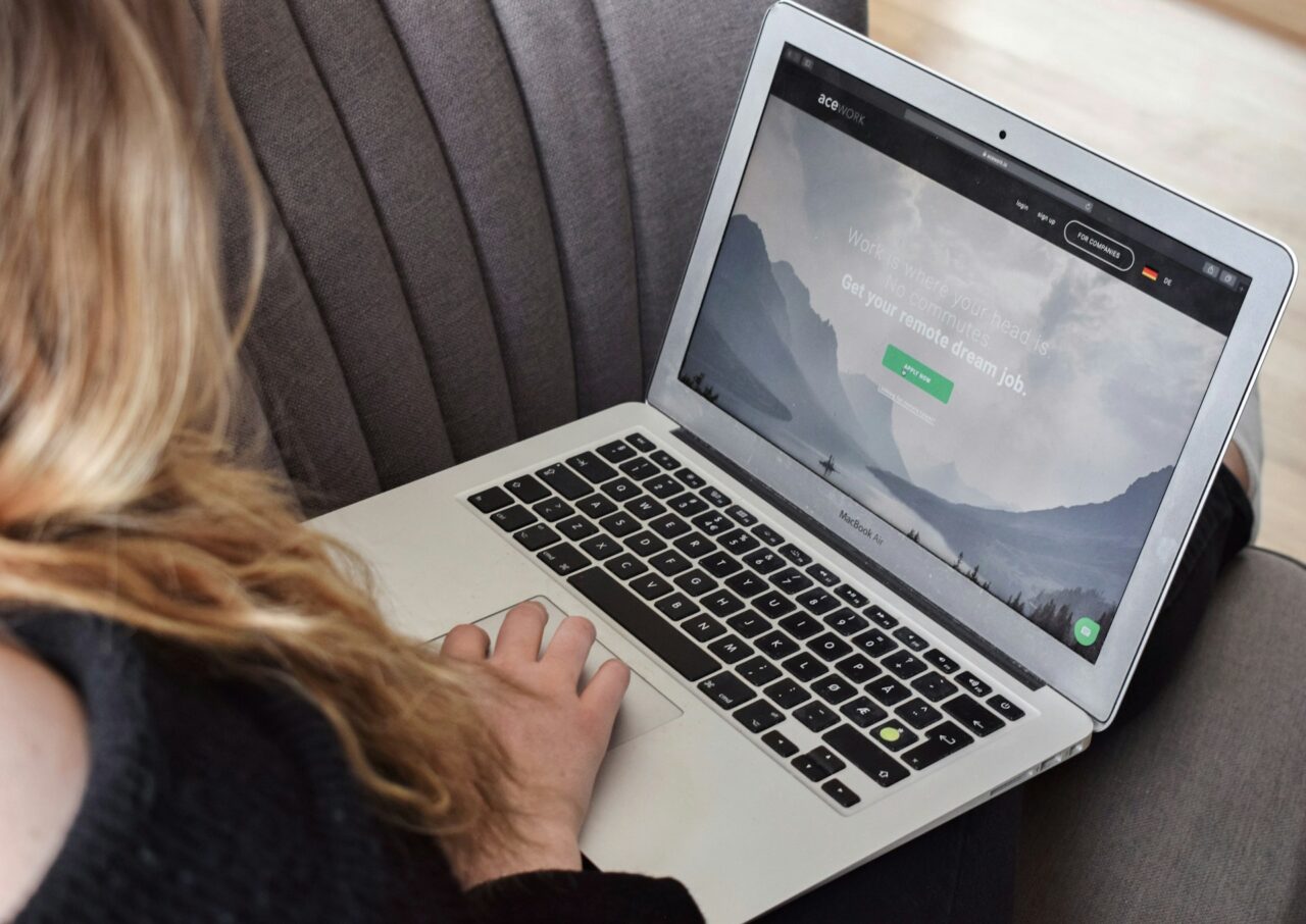 Woman with a MacBook Air working remotely