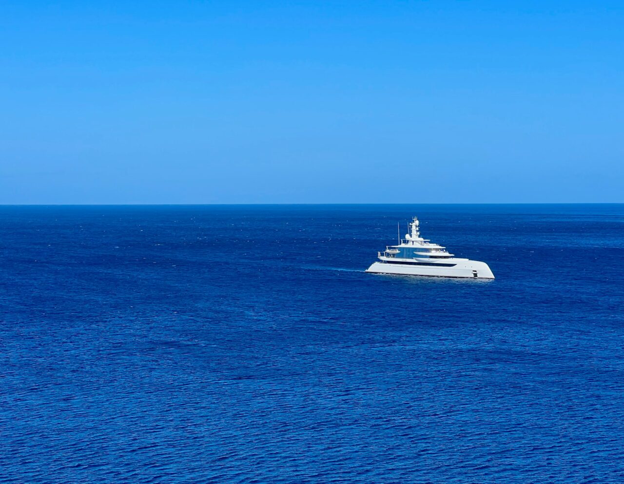 Superyacht on blue ocean on a sunny day