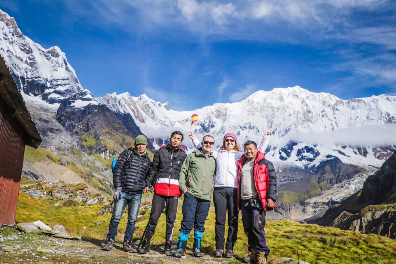 Group of people posing for a photo on the Annapurna base camp route