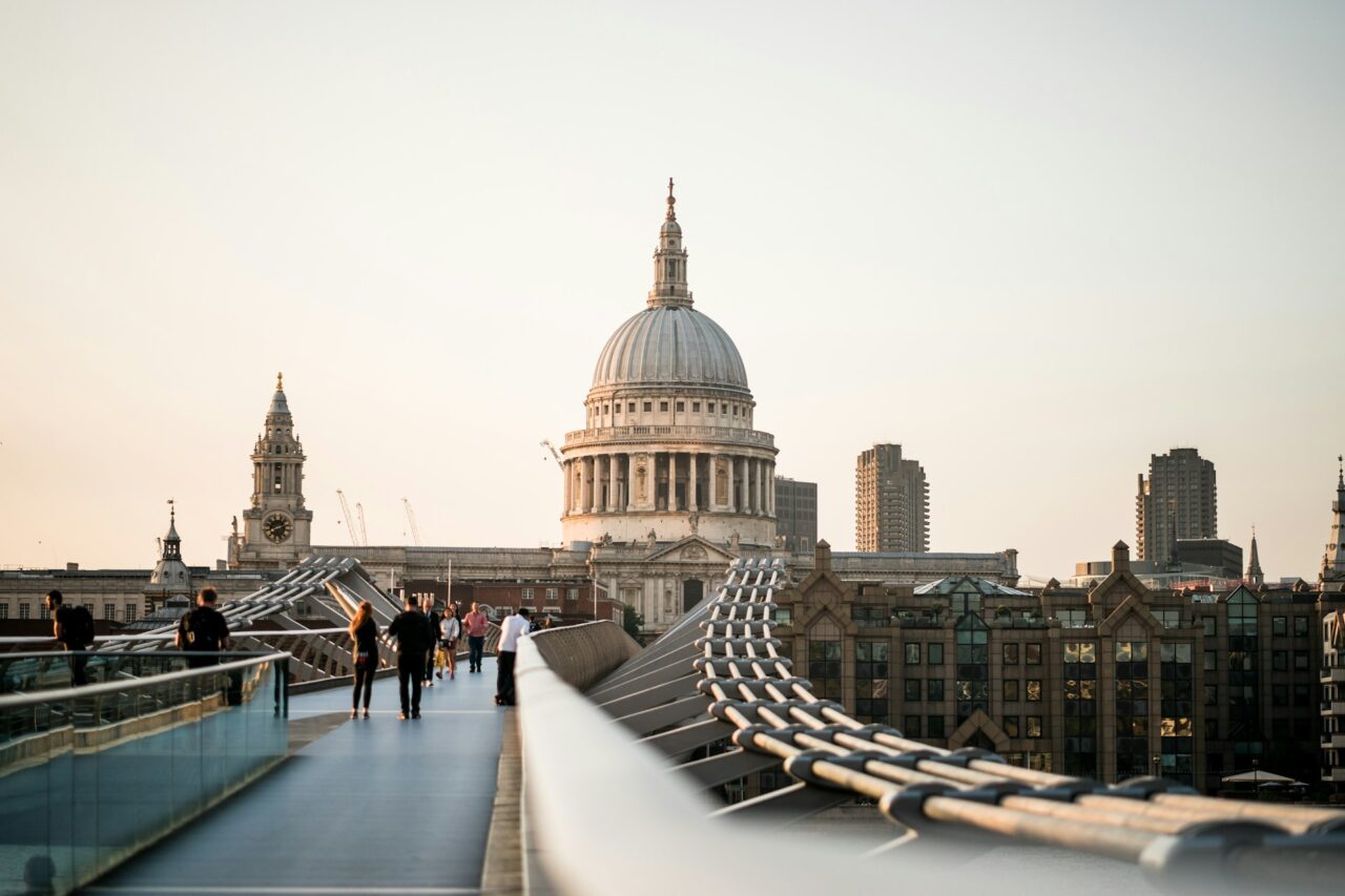 People walking on Millennium Bridge in London