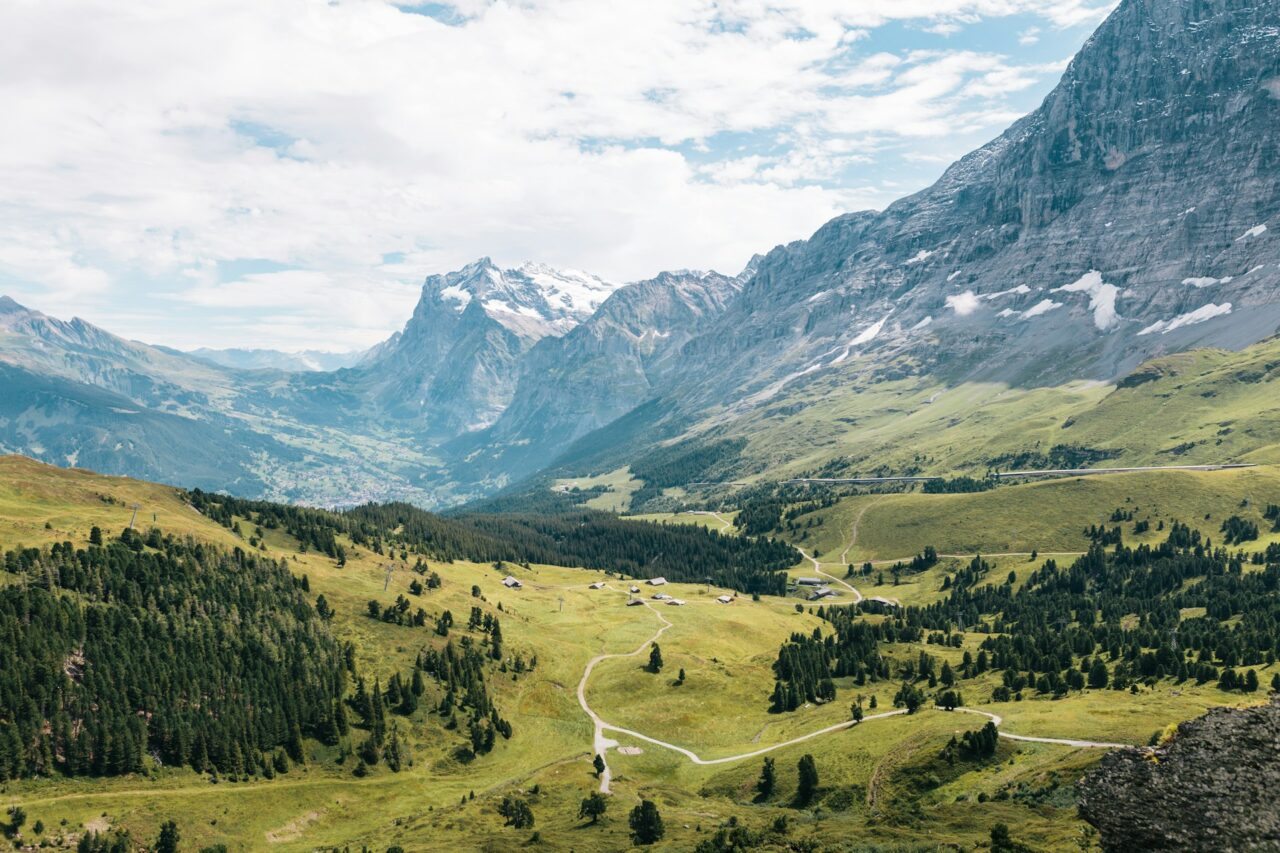 Green valley and mountains in Swiss Alps