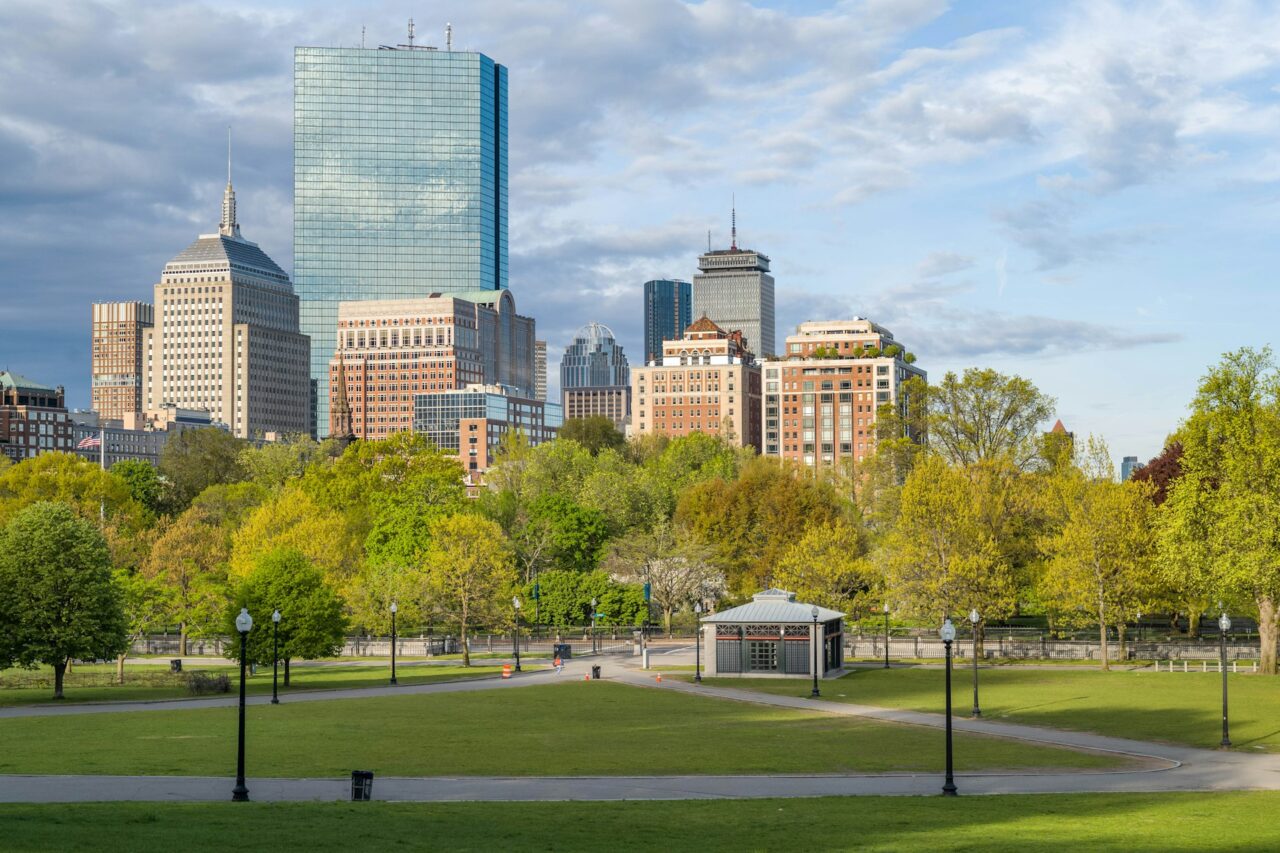 Boston common park and skyscrapers in the background