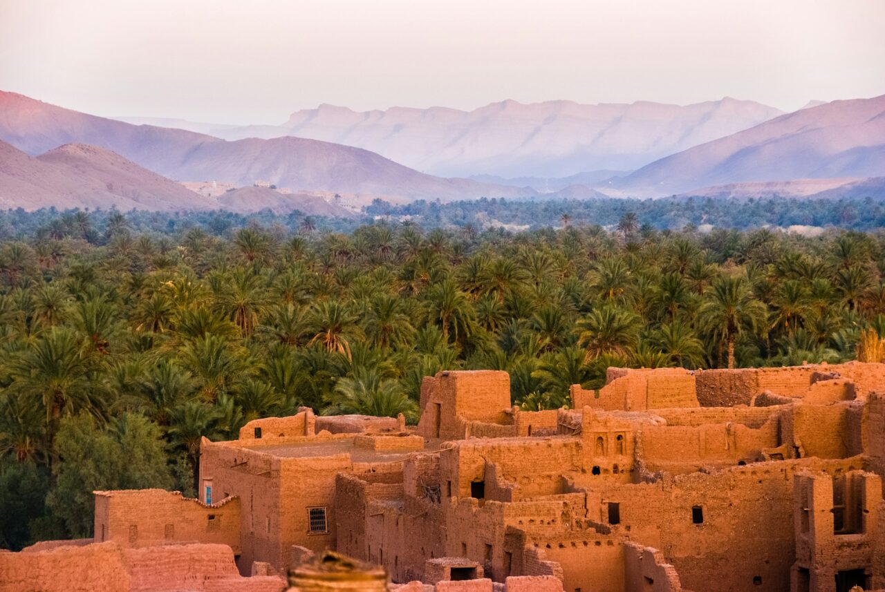 Orange rooftops and mountains in Tamnougalt Morocco