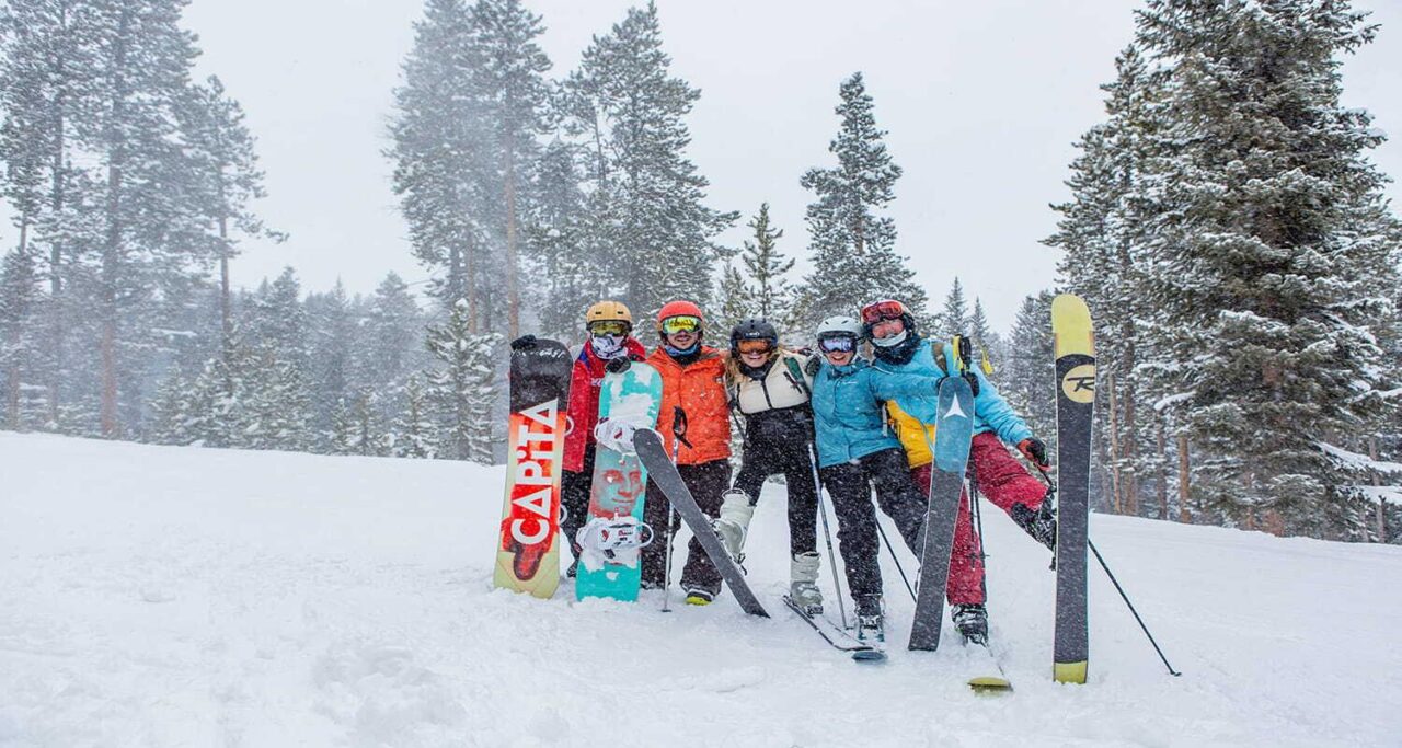 Group of people with skis on slope