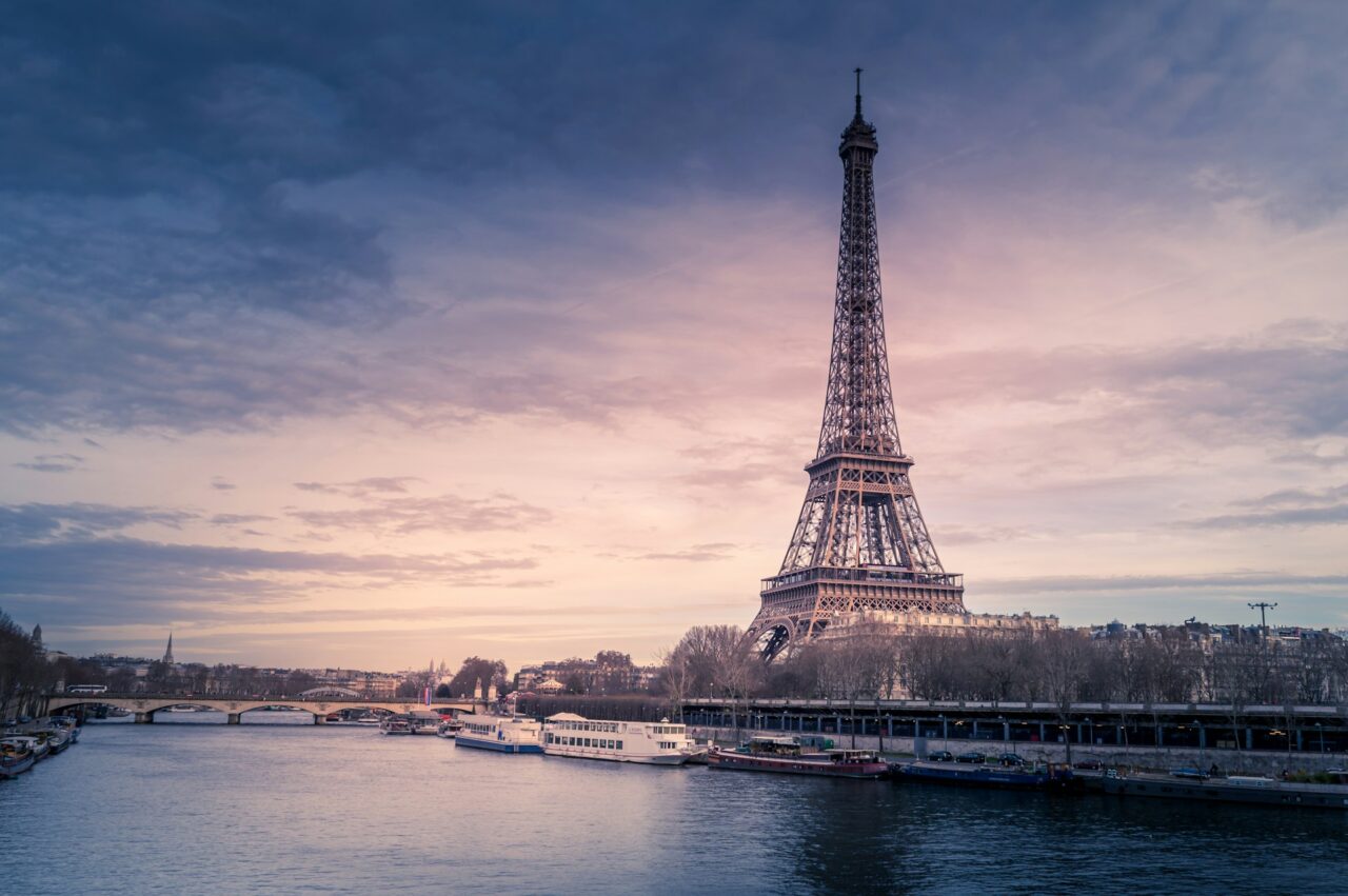 Eiffel Tower next to the river in Paris