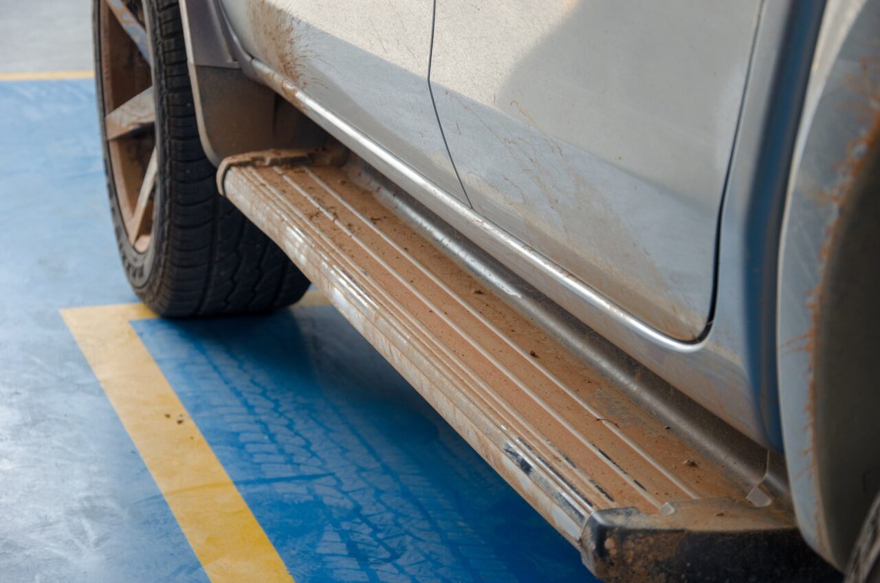 Side step on silver vehicle