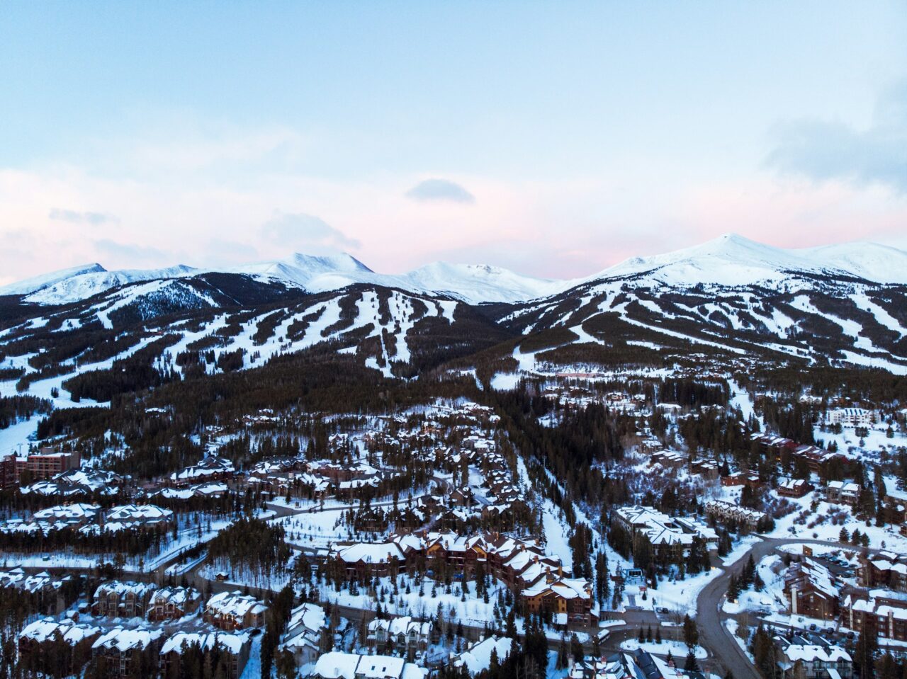 Drone shot of Breckenridge snowy mountain range